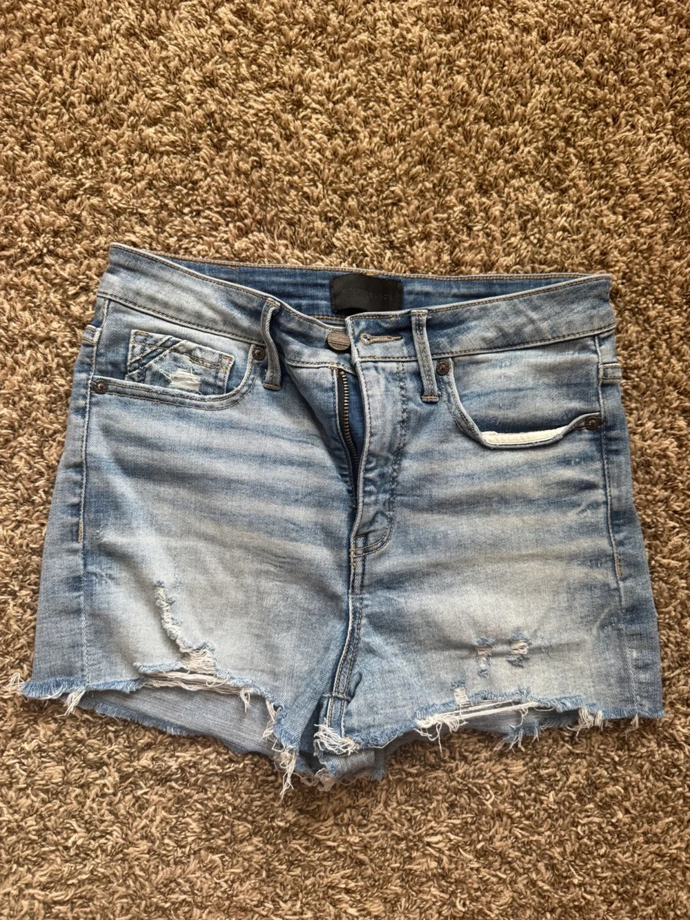 Buckle Light Blue Distressed High Rise Jean Shorts